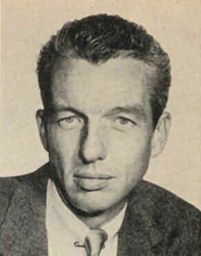 "Bob Bailey" - A black and white photograph of the American actor Bob Bailey. He is shown from the waist up, facing the camera with a serious expression on his face. He is wearing a suit and tie, and his hair is neatly combed. The image captures his professional demeanor and the confidence he exudes. Bailey was known for his work in radio dramas and detective series, and this image reflects his stature as a serious and respected performer.